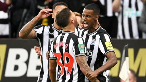 Alexander Isak (left) celebrates scoring for Newcastle against Man City