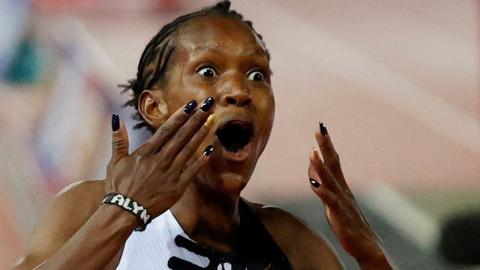 Faith Kipyegon celebrates setting the women's 1500m world record in June 2023