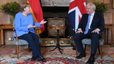 Prime Minister Boris Johnson with the Chancellor of Germany, Angela Merkel, before their bilateral meeting at Chequers