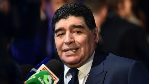 Argentinian former player Diego Maradona gives an interview as he arrives for The Best FIFA Football Awards ceremony, on October 23, 2017 in London.