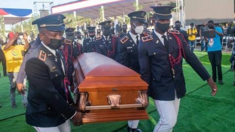 Pallbearers carry the coffin of late Haitian leader Jovenel Moïse