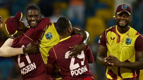 Jason Holder celebrates