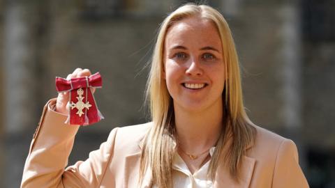 Beth Mead shows off her MBE