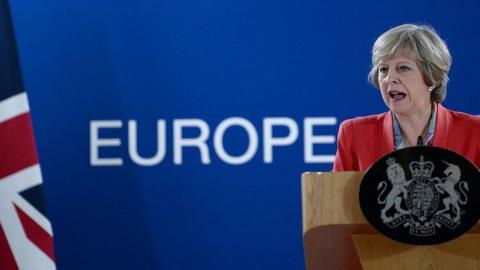 British Prime Minister Theresa May gives a press conference on the second day of a European Union leaders summit in October 2016