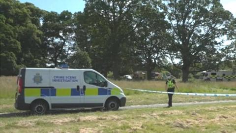 Police van and tape during the search in Carlisle