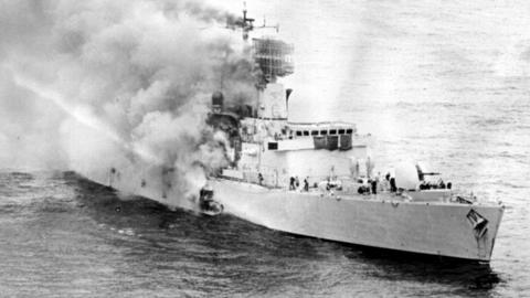 HMS Sheffield on fire