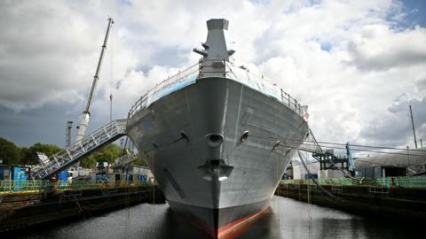 An under-construction City Class Type 26 frigate HMS Glasgow is seen in the dock.