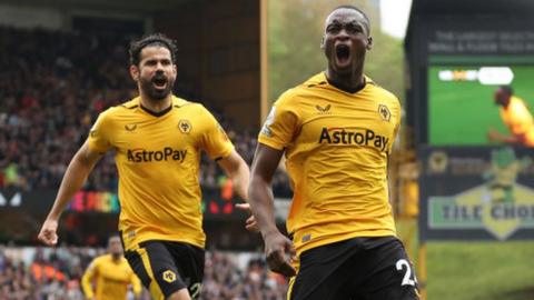 Toti and Diego Costa celebrate Wolves' early goal against Aston Villa in the Premier League