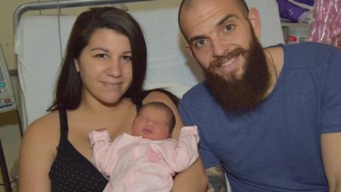 Georgios Sarris with Maria and baby Nancy