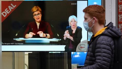 Sturgeon on TV in shop