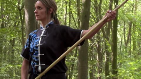 Great Britain Wushu athlete Ashleigh Wykes training in a woodland