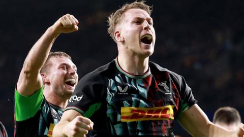 Alex Dombrandt celebrates scoring a try for Quins