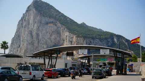 Cars queue at the border between Spain and the Rock of Gibraltar