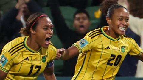Allyson Swaby (left) celebrates with Atlanta Primus (right) after scoring for Jamaica against Panama at the 2023 Fifa Women's World Cup in Perth