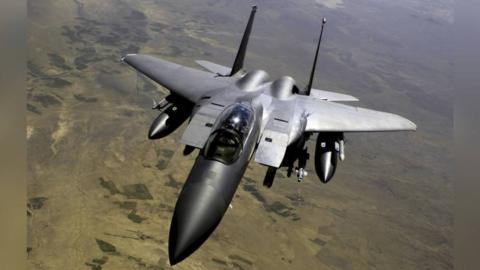 May 28, 2008 - A U.S. Air Force F-15E Strike Eagle aircraft returns to the fight after receiving fuel from a KC-135R Stratotanker during a mission over Afghanistan.