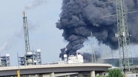 Large plumes of black smoke is seen at the site