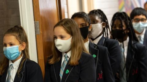 Children wearing masks in school during the pandemic in September 2020