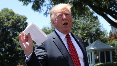 President Trump brandished a sheet of paper that had details of the deal written on it