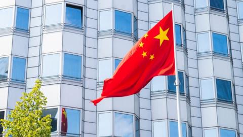 The Chinese Flag flies in front of the Embassy of the People's Republic of China in Berlin, Germany on August 13, 2020
