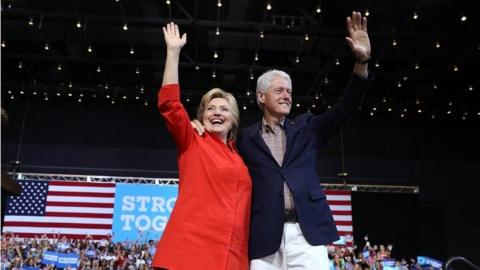 Democratic presidential nominee former Secretary of State Hillary Clinton and her husband former U.S. president Bill Clinton greet supporters during a campaign rally with democratic vice presidential nominee U.S. Sen Tim Kaine (D-VA) at the David L. Lawrence Convention Center on July 30, 2016 in Pittsburgh, Pennsylvania