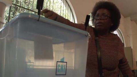 Voter in polling station in Angola