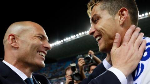 Zinedine Zidane and Cristiano Ronaldo celebrate winning the Champions League