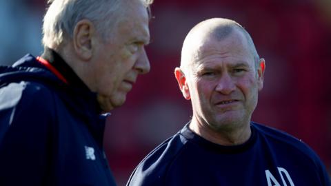 Alan Dowson (right) speaks with assistant boss Martin Tyler