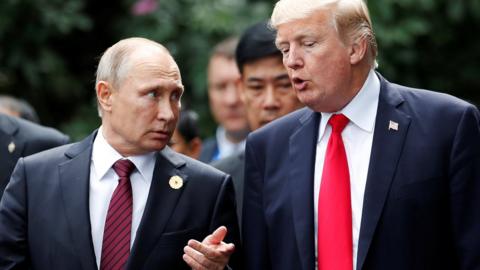 Russian President Vladimir Putin (L) with US President Donald Trump in Danang, 11 November