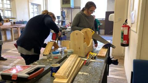 Women doing carpentry
