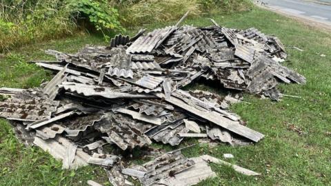 Pile of asbestos corrugated sheets