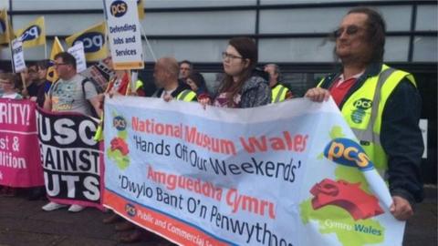 Museum staff gathered outside the Swansea's National Waterfront