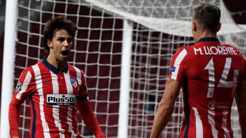 Joao Felix (left) celebrates the opening goal