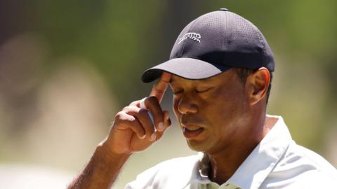 Tiger Woods grimaces on day three of the Masters