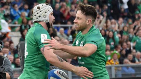 Mack Hansen and Hugo Keenan celebrate a try during Ireland's scrappy 34-20 win over Italy in Rome