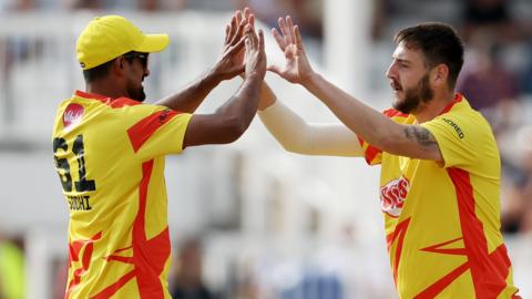 Matt Carter celebrates a wicket