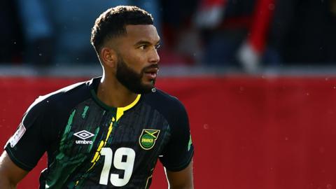 Adrian Mariappa in action with the Jamaican national side