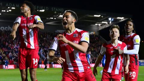 Exeter City celebrate a goal