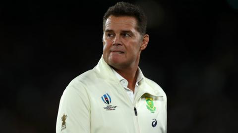 Rassie Erasmus bites his lip, looking worried