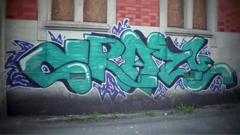 Graffiti reading "crazy"