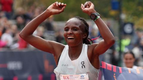 Hellen Obiri celebrates after winning the New York Marathon