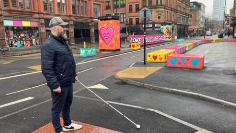 Dave Steele at a crossing in Stevenson Square in Manchester's Northern Quarter