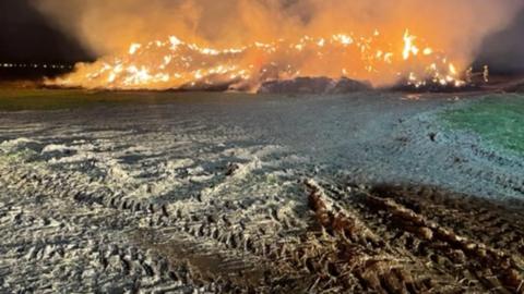 Bales of hay were on fire at a farm in Oatfield Lane, Nottinghamshire, on Friday