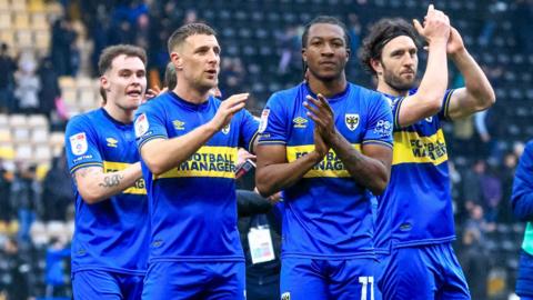 AFC Wimbledon celebrate victory over Notts County