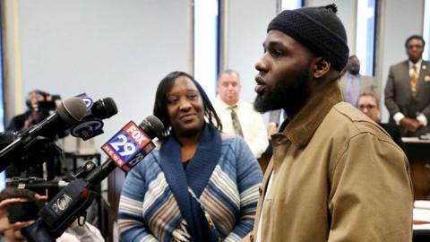 Ibn Ali Miller speaks as his mother Sabrina Winters looks on at an Atlantic City Council meeting where he was honored Wednesday March 22, 2017, in Atlantic City.