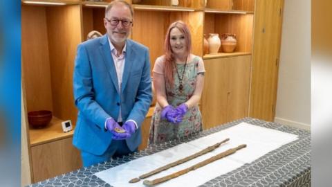 The two swords with Cllr Paul Hodgkinson and Museum Director Emma Stuart