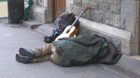 Someone sleeping rough in the street