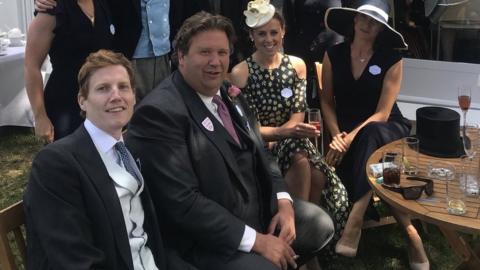 Johnno Spence, centre, wearing the suit destined for Thomas Markle