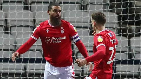 Lewis Grabban (left) celebrates scoring for Nottingham Forest