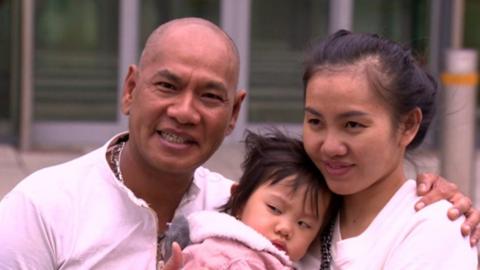 Vance McElhinney, his partner Le and baby Liz