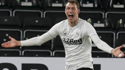 Derby County midfielder Krystian Bielik celebrates the opening goal against Bournemouth